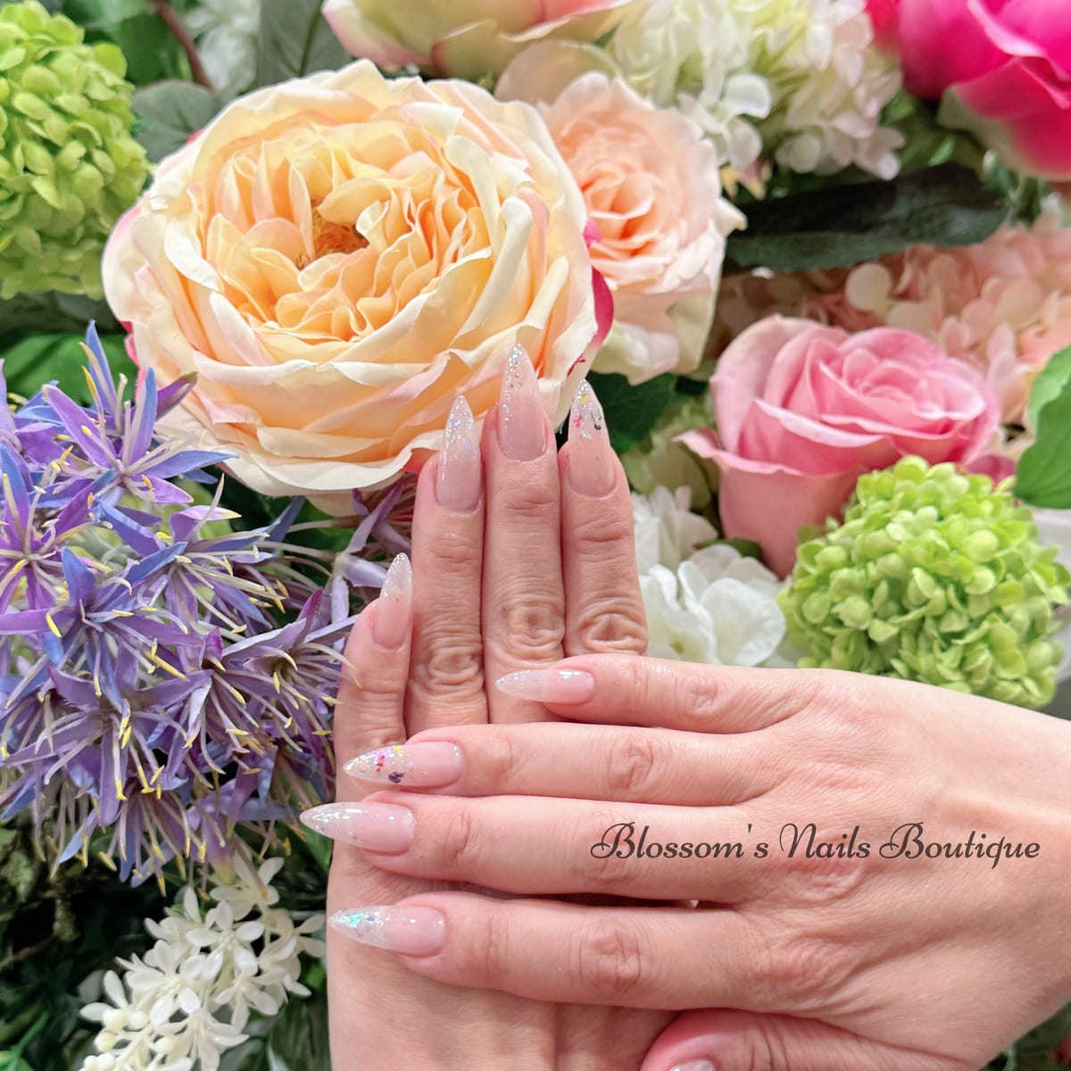 Nude pink ombré nails with fine glitter at Blossom's Nails Boutique